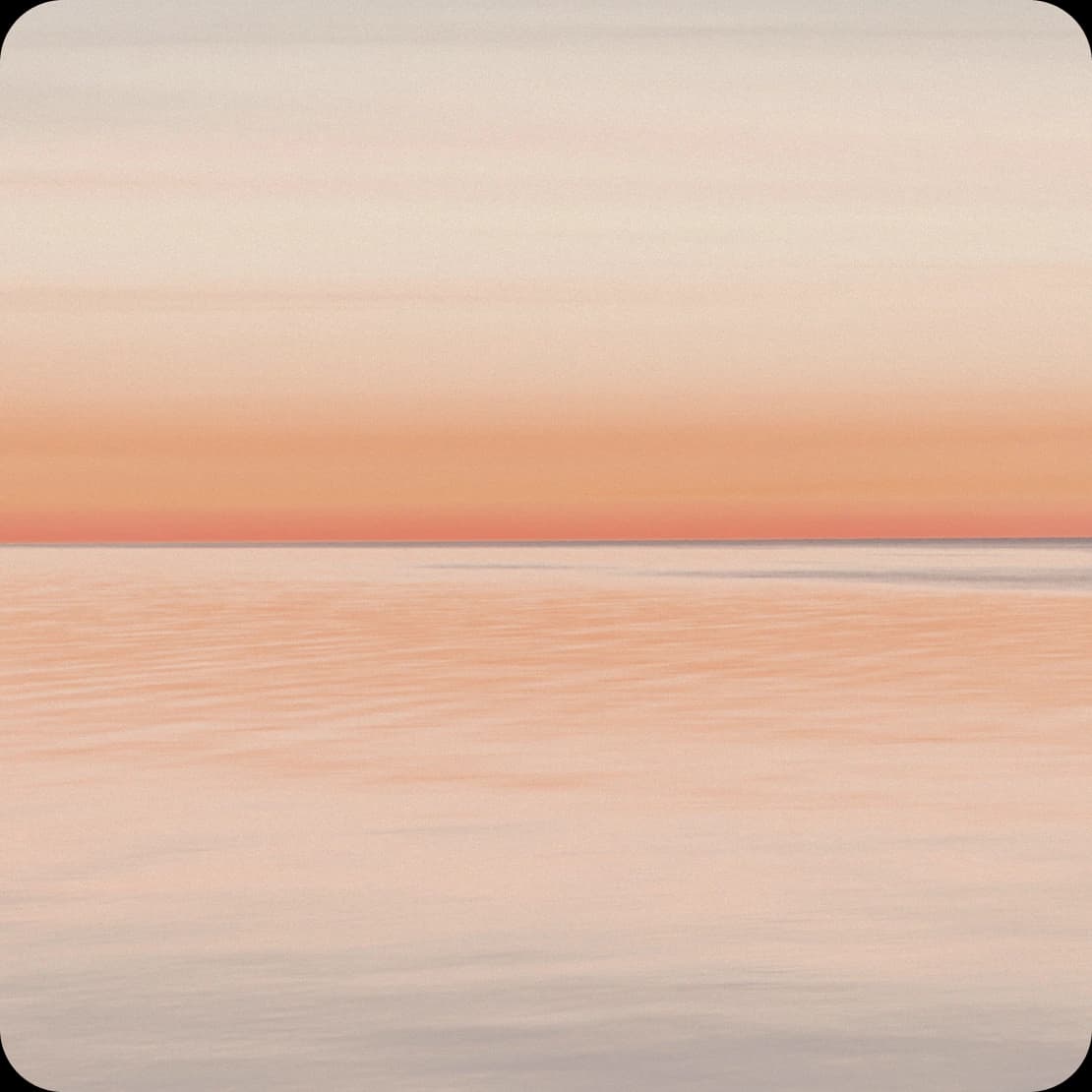 A warm sea horizon at golden hour